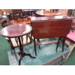 A drop leaf table and a wine table.