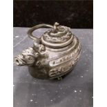 A Japanese bronzed ceremonial teapot with chi chi spout. signed