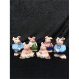 A collection of six Wade Nat west Pigs.