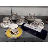 A set of five Wedgwood coffee cans in the Kutani Crane pattern together with one other and a china