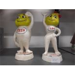 Two reproduction metal Esso Mascot figures.