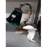 A Poole Pottery model of a leaping fish in white together with an Art Nouveau style brass table lamp