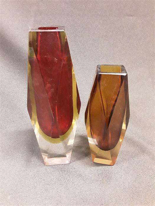 Two red and green cased Italian or bohemian oblong shaped glass vases, of faceted form.