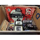 A box of collectables to include DVD's, pictures, books etc.