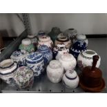 Nineteen various ginger jars of different patterns and sizes together with an auctioneers gavel.