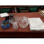 Mixed lot containing glassware, scales with weights and some tablecloths.