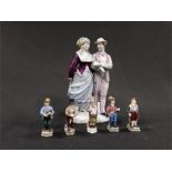 Five small German Meissen design china street seller figures together with a large lady and