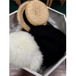 A Harvey Nichols hat box containing 8 vintage hats to include mink.