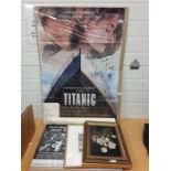 A signed Titanic poster by Kate Winslet together with other posters and pictures.
