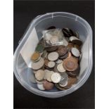 A tub of various coins.