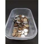 A tub of various coins.
