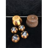 Four Ronson table lighters encased in wood and two tobacco jars.