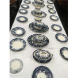 An extensive dinner service in excess of 50 pieces including 9 serving plates, 6 tureen, 15 dinner