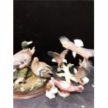 Two resin sculptures, "Restful Days" by Barry Price, Limited Edition 147/850 with eagle sculpture