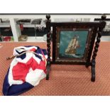 A large British flag together with a table top screen decorated with a ship 'Sovereign of the Seas