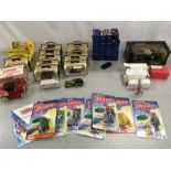 A collection of boxed diecast toy vehicles and Thunderbird figures. A Jaguar XK 120 roadster by