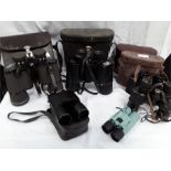 Various pairs of binoculars.