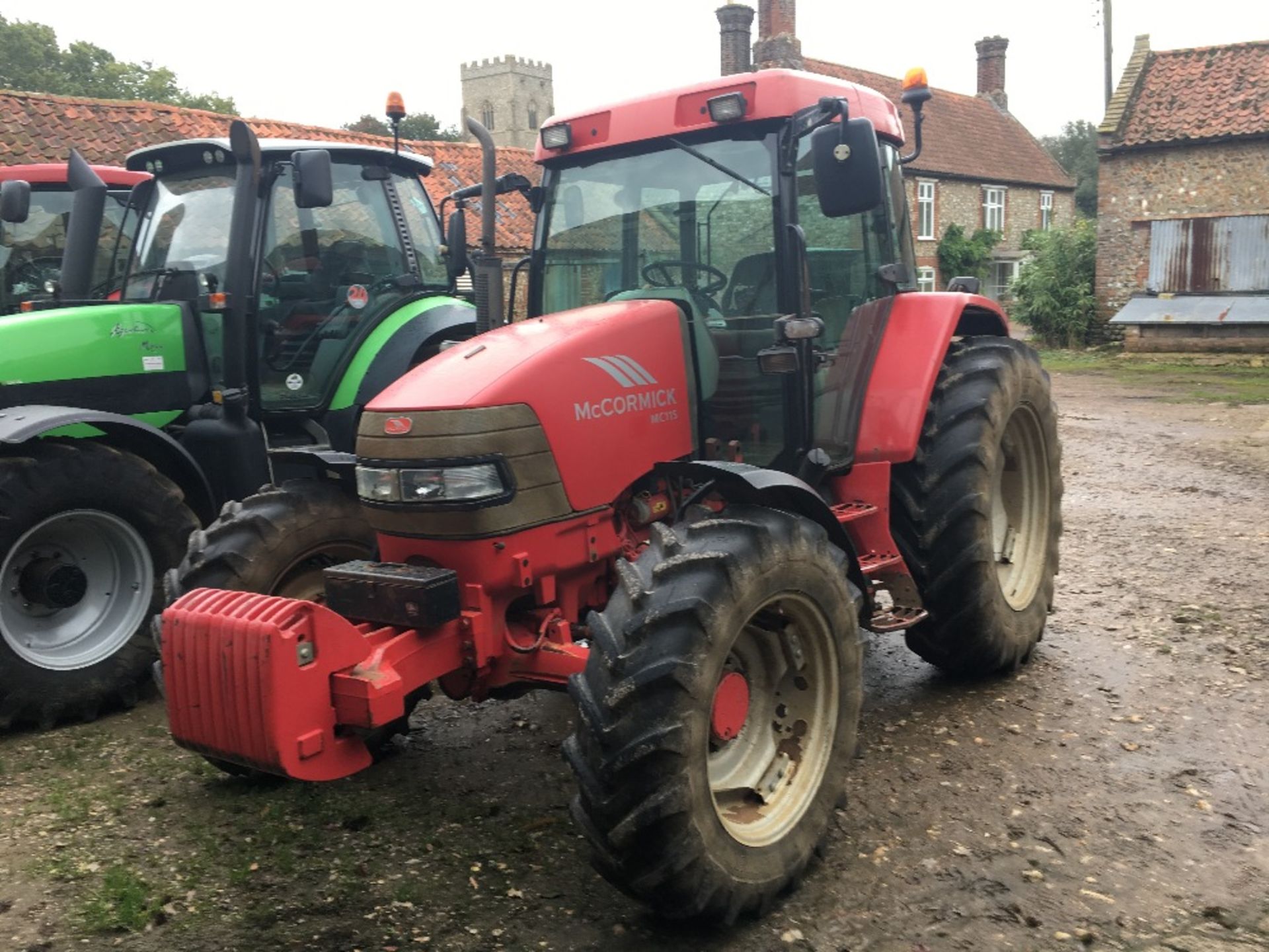 2003 McCormick MC115 tractor, front wafer weights, Rear Tyres: 12.4 R46, Front Tyres: 270/95 R32.