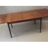 A mid C20th rosewood veneered draw leaf dining table with detachable legs, 29" x 33" x 51", 87"