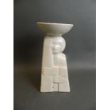 A cream glazed porcelain lamp/candlestick in the form of embracing figures, signature verso, 11"