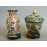 A Chinese plique-à-jour baluster vase with floral decoration, on a wood stand, together with a