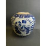 A Chinese earthenware jar with blue and white decoration of women in a garden, 12" high