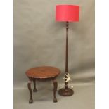 A walnut shaped top occasional table, and an oak standard lamp