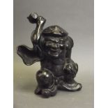 An antique Japanese bronze figure of Diakoku with black patination, 7½" high