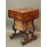 A C19th figured mahogany drop leaf work table with two drawers and sliding basket, the top drawer