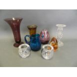 A small collection of art and studio glass including a Wedgwood paperweight, pair of Koska posies,