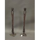 A pair of Art Nouveau bronzed spelter candlesticks, 26" high