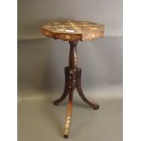 A stained wood occasional table with Ottoman decoration and mother of pearl and silver wire inlaid