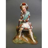 A porcelain figure of a Scottish highlander seated on a rock with a small dog asleep at his feet,