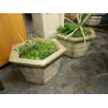 A pair of concrete garden pots, 18" x 12"