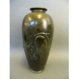 A C19th Japanese bronze vase with embossed decoration of roosting cranes, character mark to base,