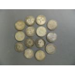 A collection of mixed metal facsimile Chinese coins, 1½" diameter (14)