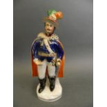 A Staffordshire figure of a prince in ceremonial uniform, 9½" high