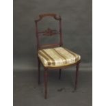 A late C19th walnut side chair with the finest of carved detail in the French style, lacks on finial