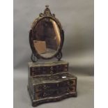 A late C18th/early C19th Chinese Export black lacquer toilet mirror with gilt decoration, the top