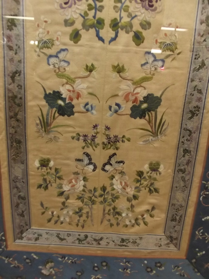 A late C19th Chinese silk embroidery of butterflies amongst flowers, 16" x 28" - Image 3 of 3