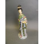 A Chinese cloisonné enamel figure with bone hand and head, 11" high