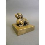 A Chinese bronze seal with kylin surmount, 3" square