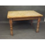 A pine scullery table raised on turned supports, detachable, 48" x 35"