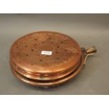 A late C18th/early C19th copper warming pan with pierced and engraved cover, possibly Dutch, 11"