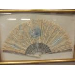 A C19th lace and mother of pearl fan painted with cherubs, framed, fan 11½" long