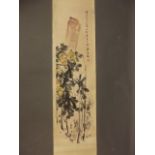 A Chinese printed scroll with hand finishes depicting fruiting branches, 13½" x 53"