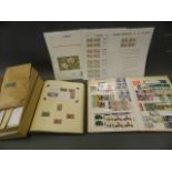 Two albums of Great British and world stamps, together with a box of loose stamps