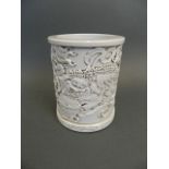 A Chinese Blanc de Chine brush pot with twin kylin decoration, seal mark to base, 5½" x 4½"