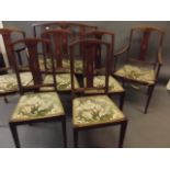 A seven piece Edwardian inlaid mahogany parlour suite