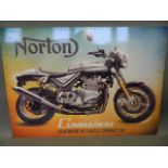 A metal advertising sign for 'Norton Motorycles', 27½" x 20"